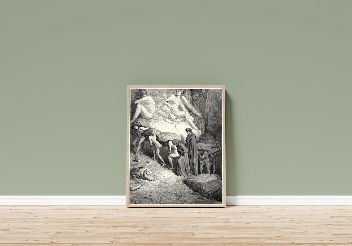 Framed art print of Purgatorio, Canto XII: Oxen in the Yoke by Gustave Doré, in a light wood frame leaning on a sage green wall above a wooden floor