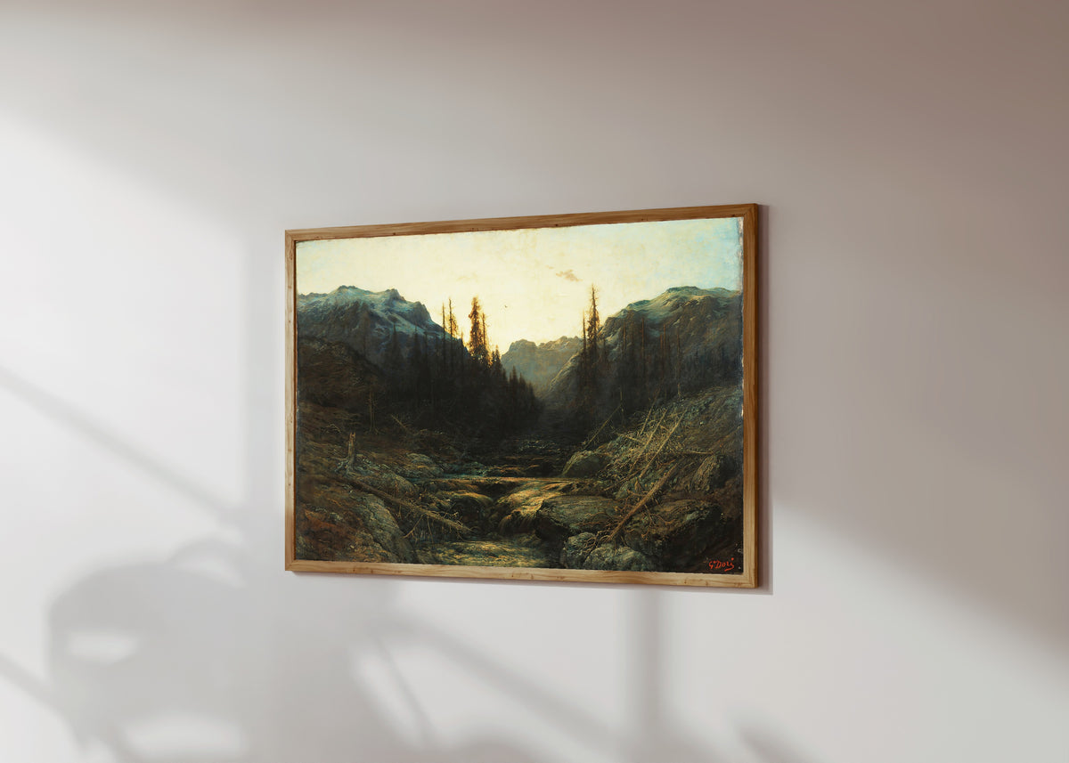 Framed art print of Stream in Mountains at Dusk by Gustave Doré, in a light wood frame on a sunlit white wall, seen at a slight angle
