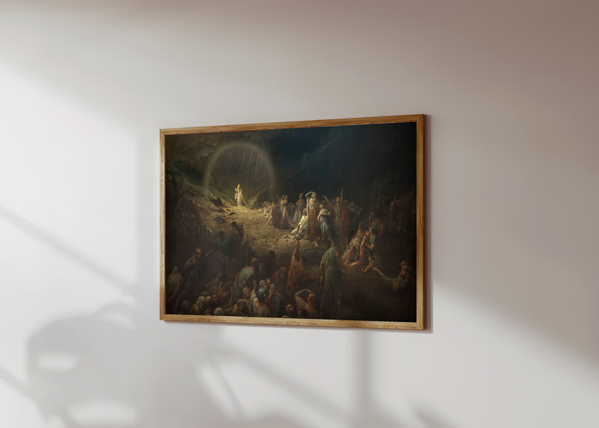 Framed art print of The Vale of Tears (La Vallée des larmes) by Gustave Doré, in a light wood frame on a sunlit white wall, seen at a slight angle