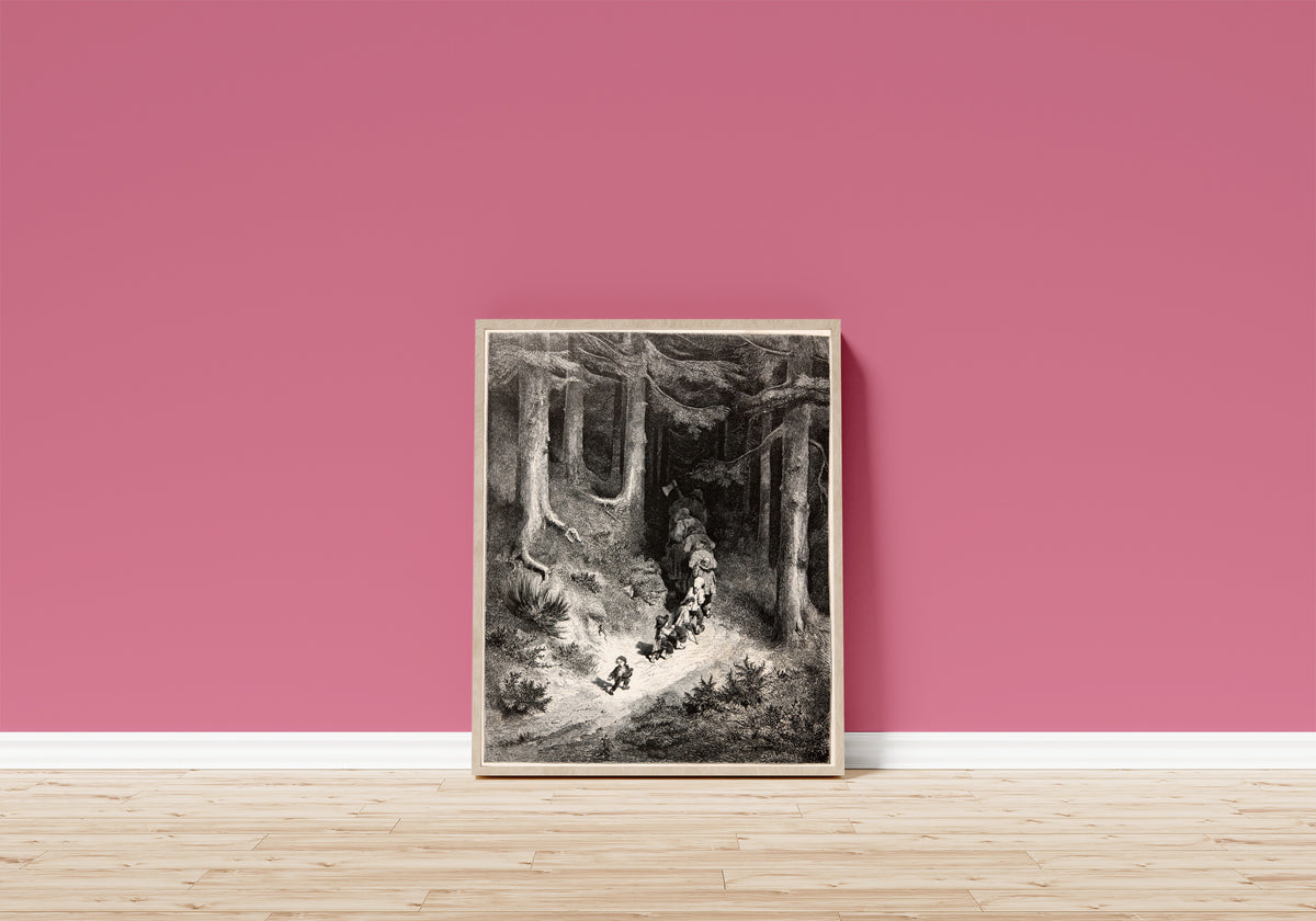 Framed art print of Tom Thumb: Leading His Brothers Through the Forest by Gustave Doré, in a light wood frame leaning on a pink wall above a wooden floor