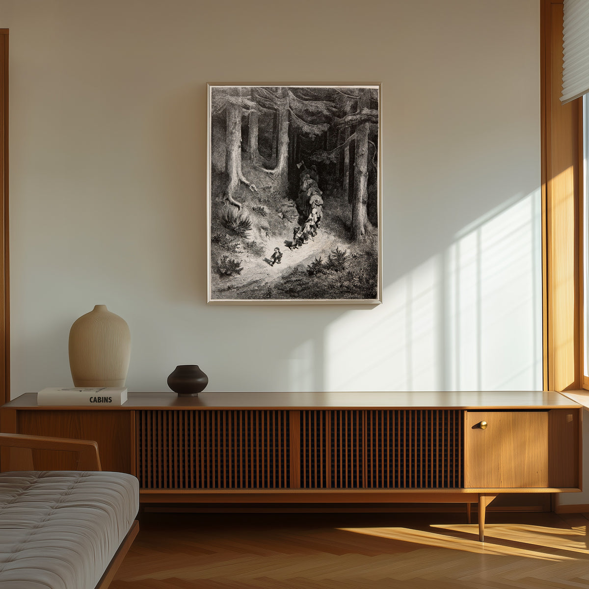 Framed art print of Tom Thumb: Leading His Brothers Through the Forest by Gustave Doré, in a thin light frame on a sunlit wall above a wooden sideboard