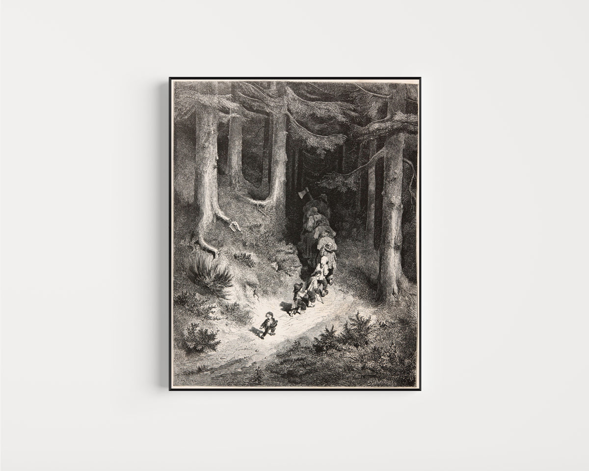 Framed art print of Tom Thumb: Leading His Brothers Through the Forest by Gustave Doré, in a slim black frame on a plain white wall