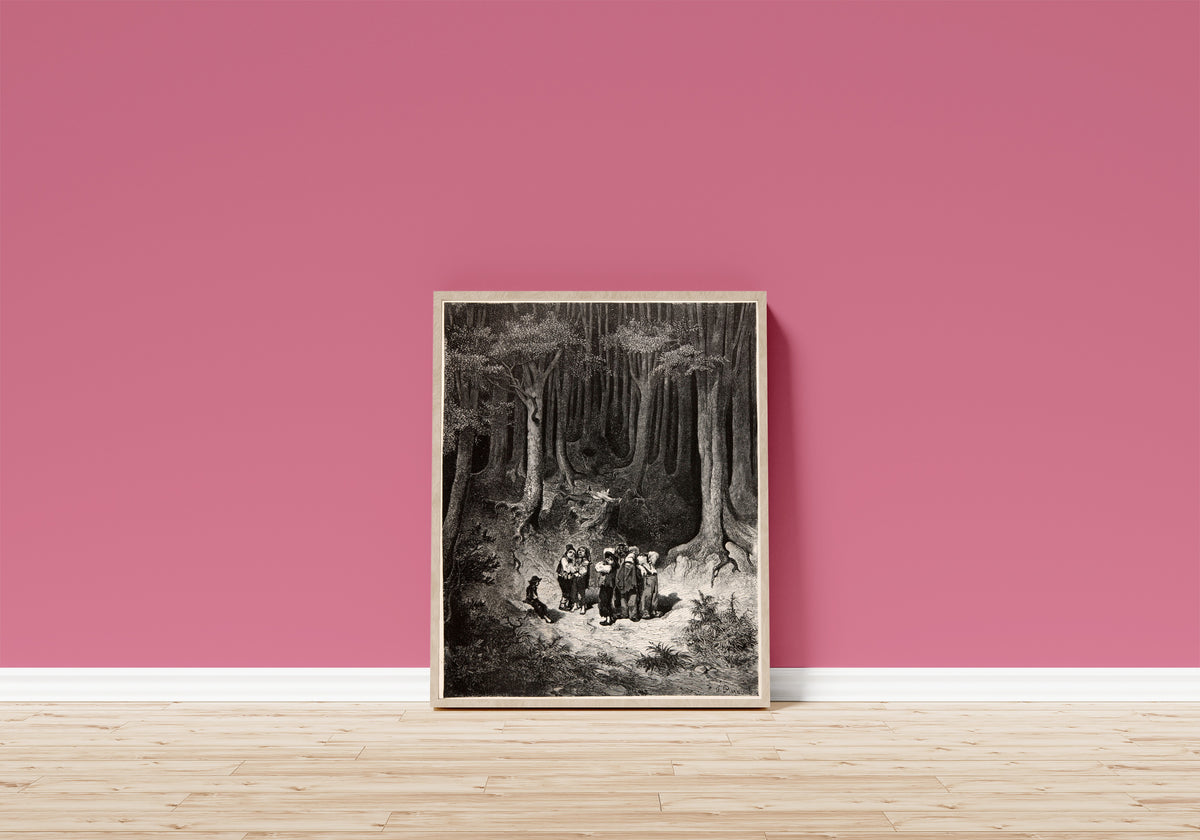 Framed art print of Tom Thumb: Lost in the Forest by Gustave Doré, in a light wood frame leaning on a pink wall above a wooden floor