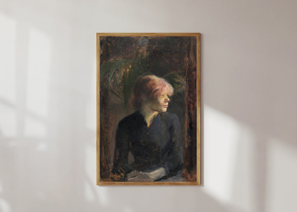 Framed art print of Carmen Gaudin by Henri de Toulouse-Lautrec, in a light wood frame on a sunlit white wall