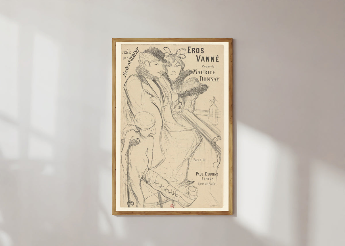 Framed art print of Eros Vanné by Henri de Toulouse-Lautrec, in a light wood frame on a sunlit white wall