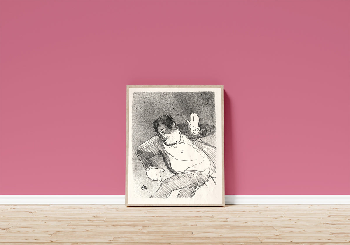Framed art print of Le Café-Concert: Caudieux by Henri de Toulouse-Lautrec, in a light wood frame leaning on a pink wall above a wooden floor