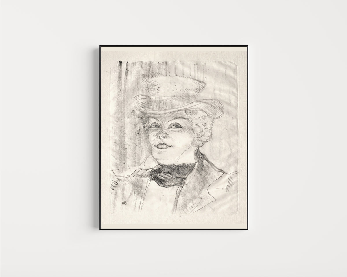 Framed art print of Madame Réjane by Henri de Toulouse-Lautrec, in a slim black frame on a plain white wall