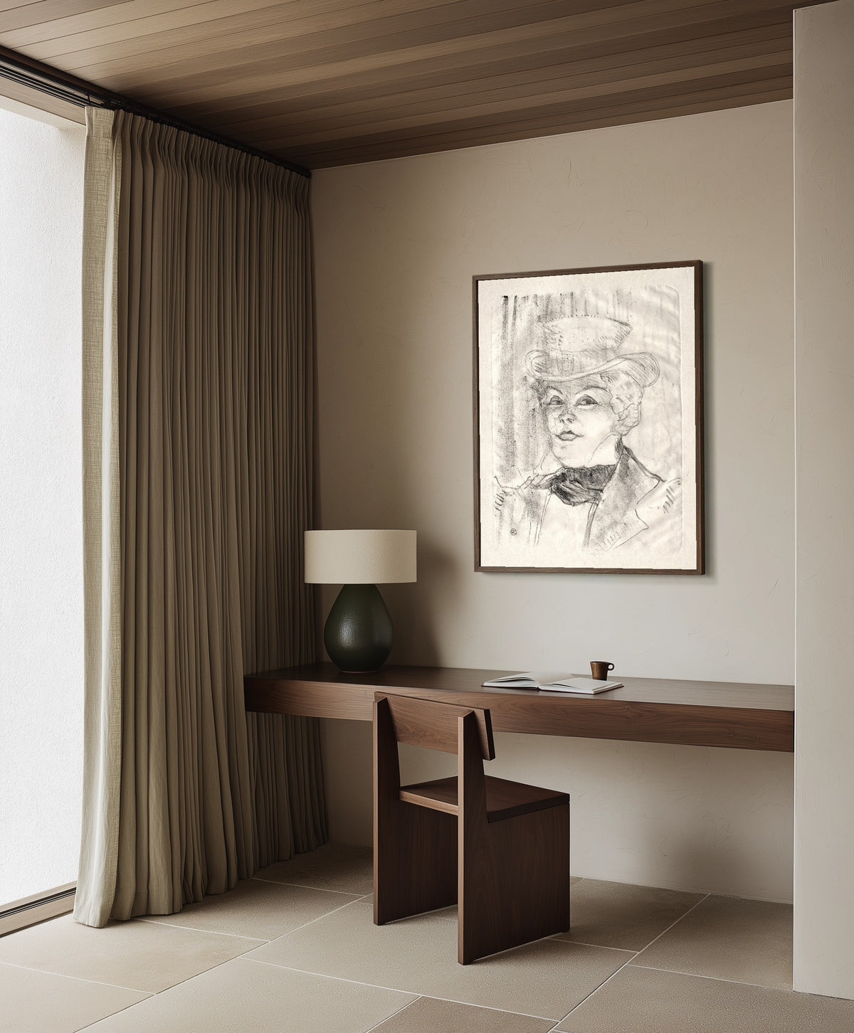 Framed art print of Madame Réjane by Henri de Toulouse-Lautrec, in a dark wood frame on a plaster wall above a walnut desk