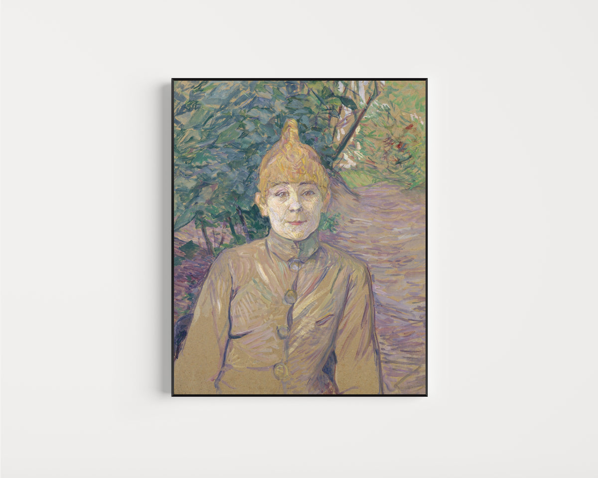 Framed art print of The Streetwalker by Henri de Toulouse-Lautrec, in a slim black frame on a plain white wall