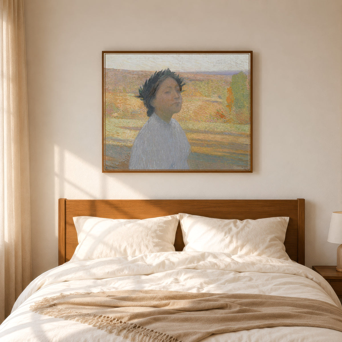 Framed art print of Buste de jeune fille avec une couronne de laurier by Henri Martin, in a slim wood frame above a bed in a sunlit bedroom