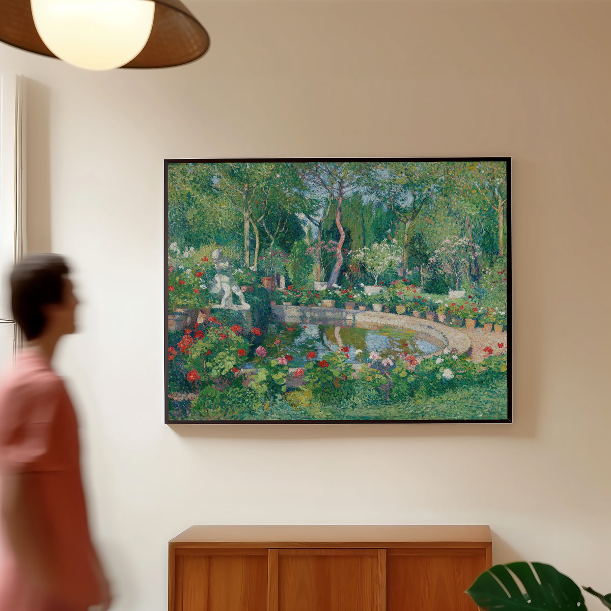 Framed art print of Grand bassin du parc de Marquayrol by Henri Martin, in a slim black frame on a warm wall in a sunlit room
