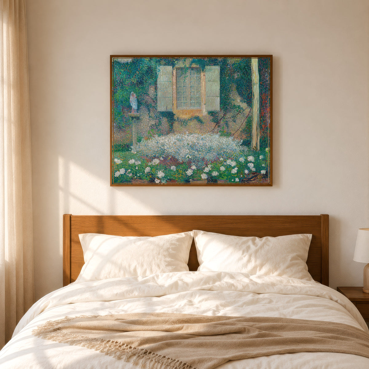 Framed art print of La Fenêtre de la cuisine sur le jardin à Marquayrol by Henri Martin, in a slim wood frame above a bed in a sunlit bedroom