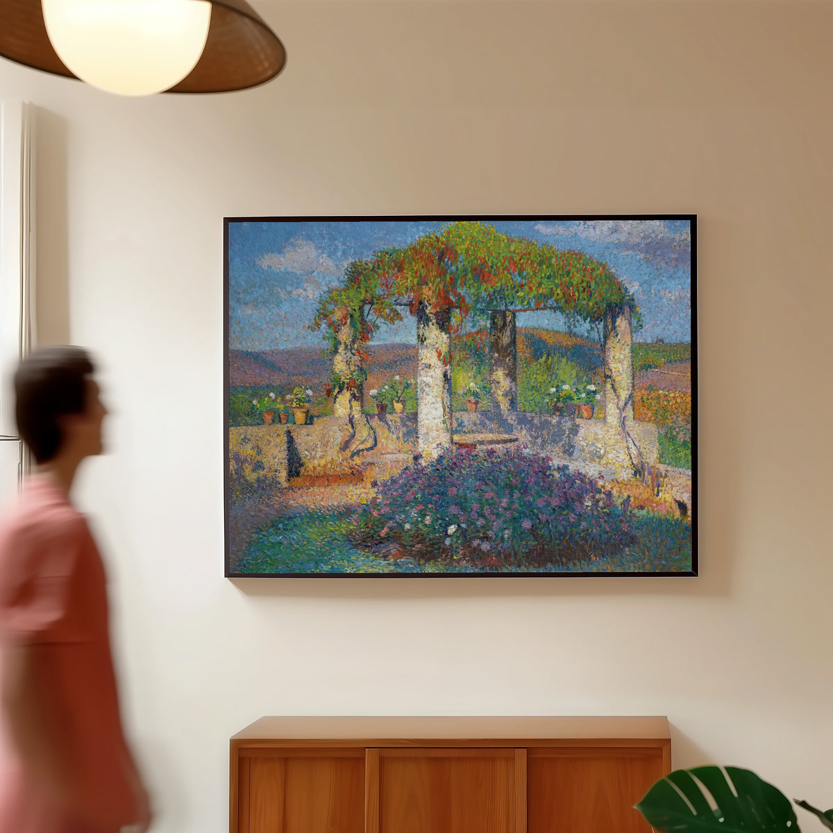 Framed art print of La Tonnelle de l'angle nord-ouest du parc de Marquayrol by Henri Martin, in a slim black frame on a warm wall in a sunlit room