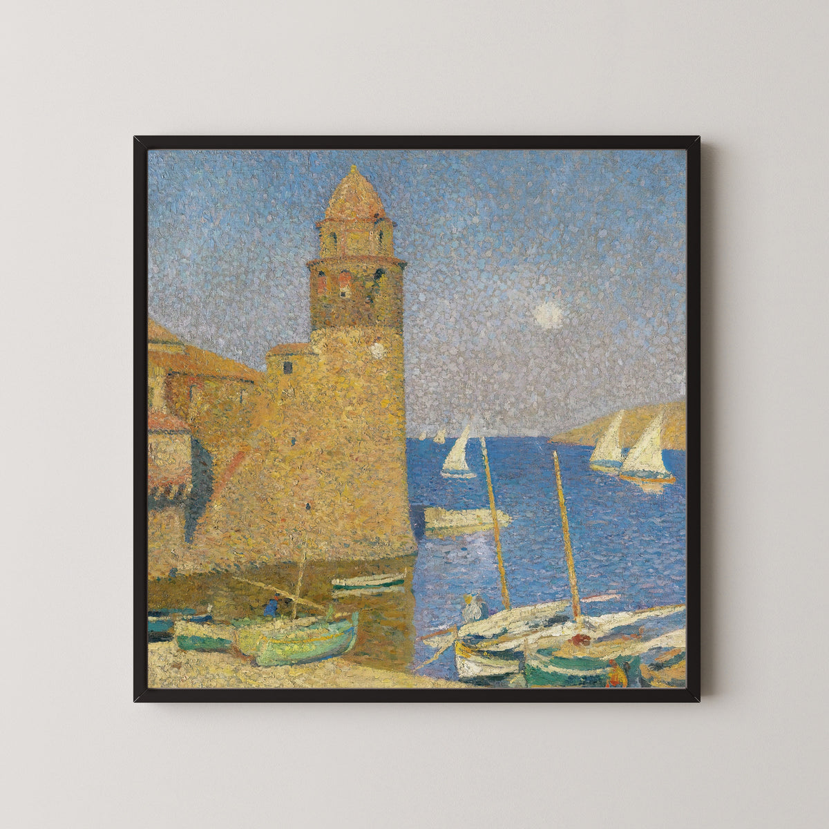 Framed art print of La Tour de Collioure, lever de lune by Henri Martin, in a black frame on a pale wall