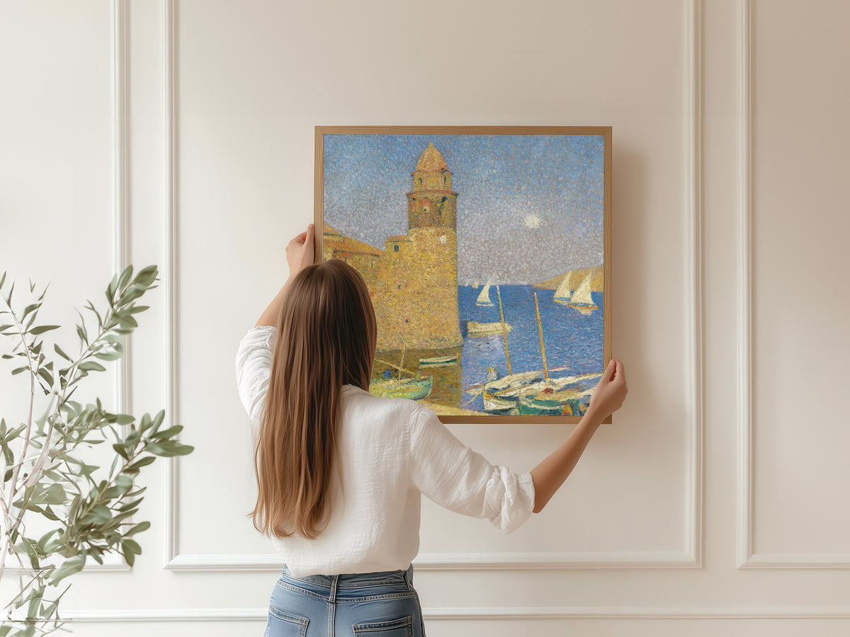 Framed art print of La Tour de Collioure, lever de lune by Henri Martin, hung on a panelled wall