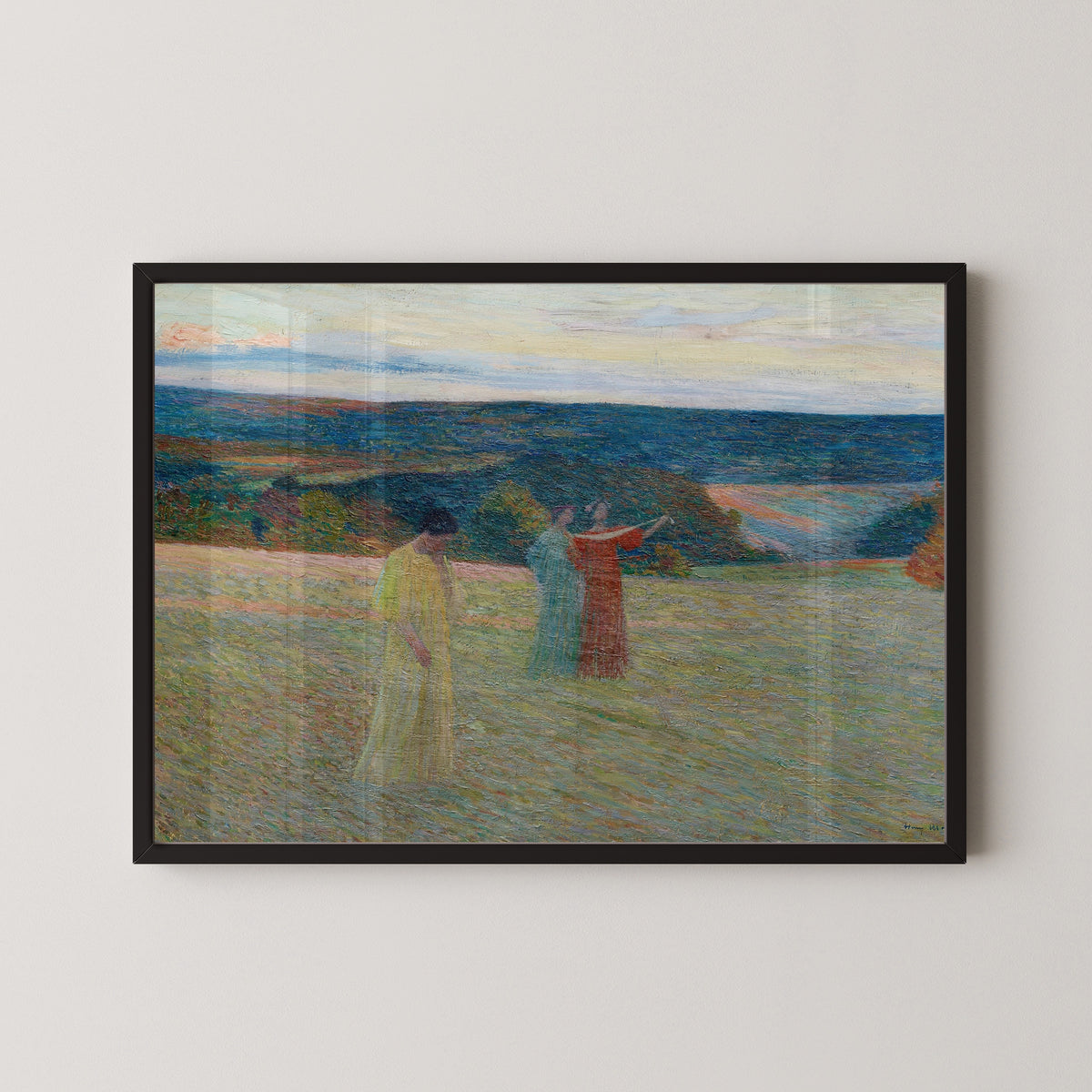 Framed art print of Les Trois Muses by Henri Martin, in a black frame on a pale wall