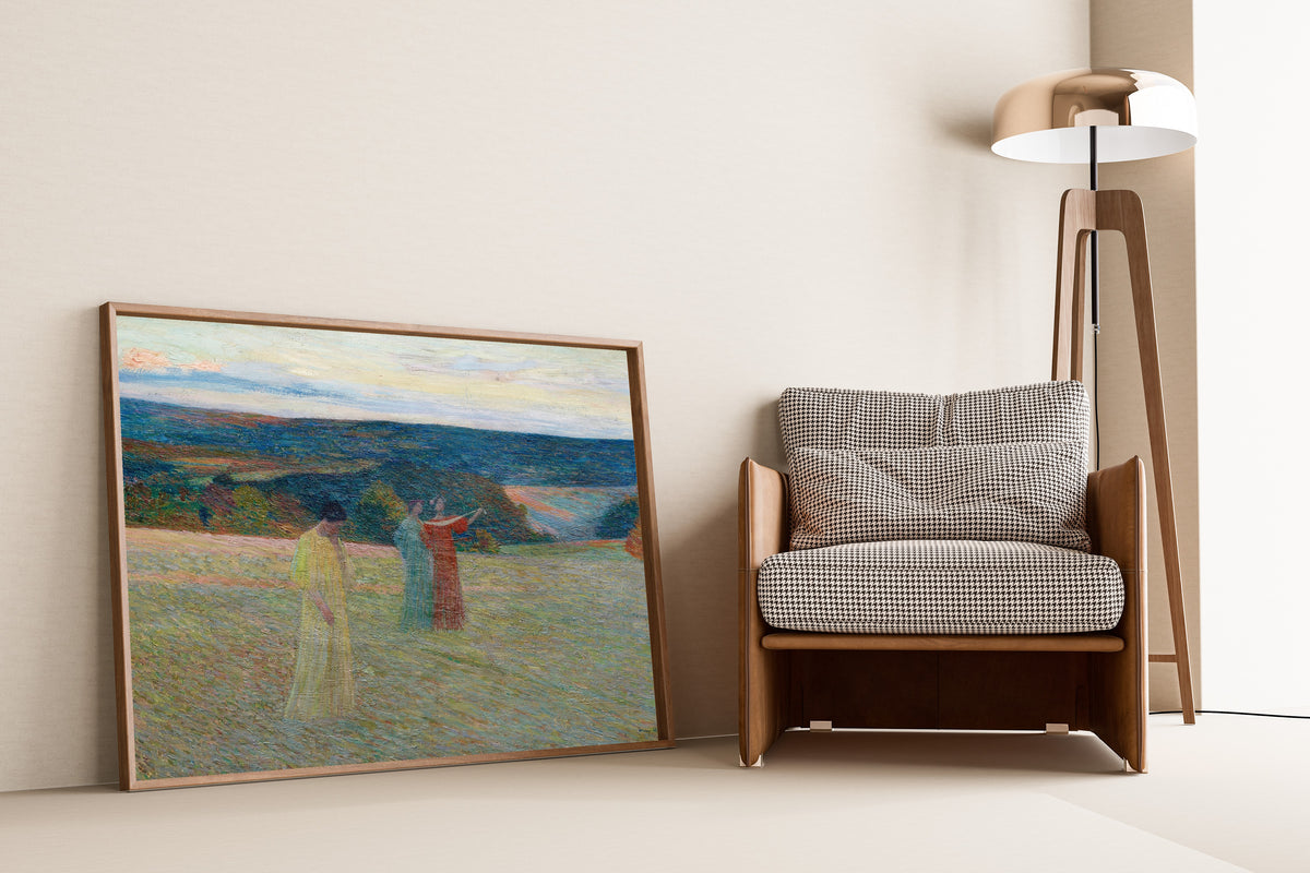 Framed art print of Les Trois Muses by Henri Martin, leaning against a wall beside an armchair and a floor lamp