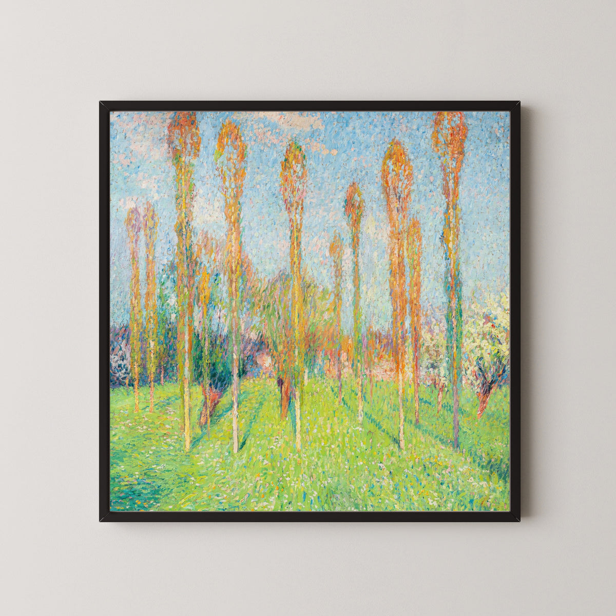 Framed art print of Prairie ensoleillée aux peupliers by Henri Martin, in a black frame on a pale wall