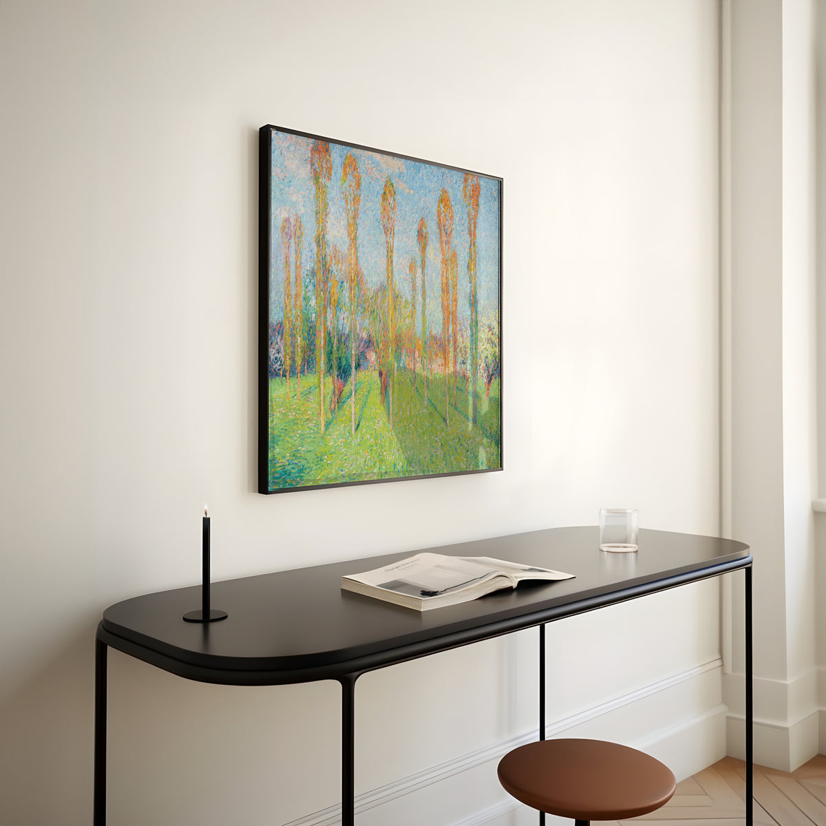 Framed art print of Prairie ensoleillée aux peupliers by Henri Martin, above a slim black console table