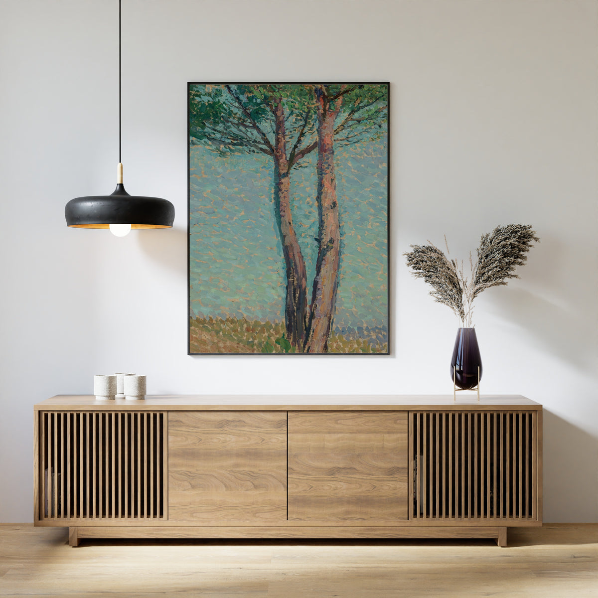Framed art print of Un pin by Henri Martin, above a slatted wood sideboard