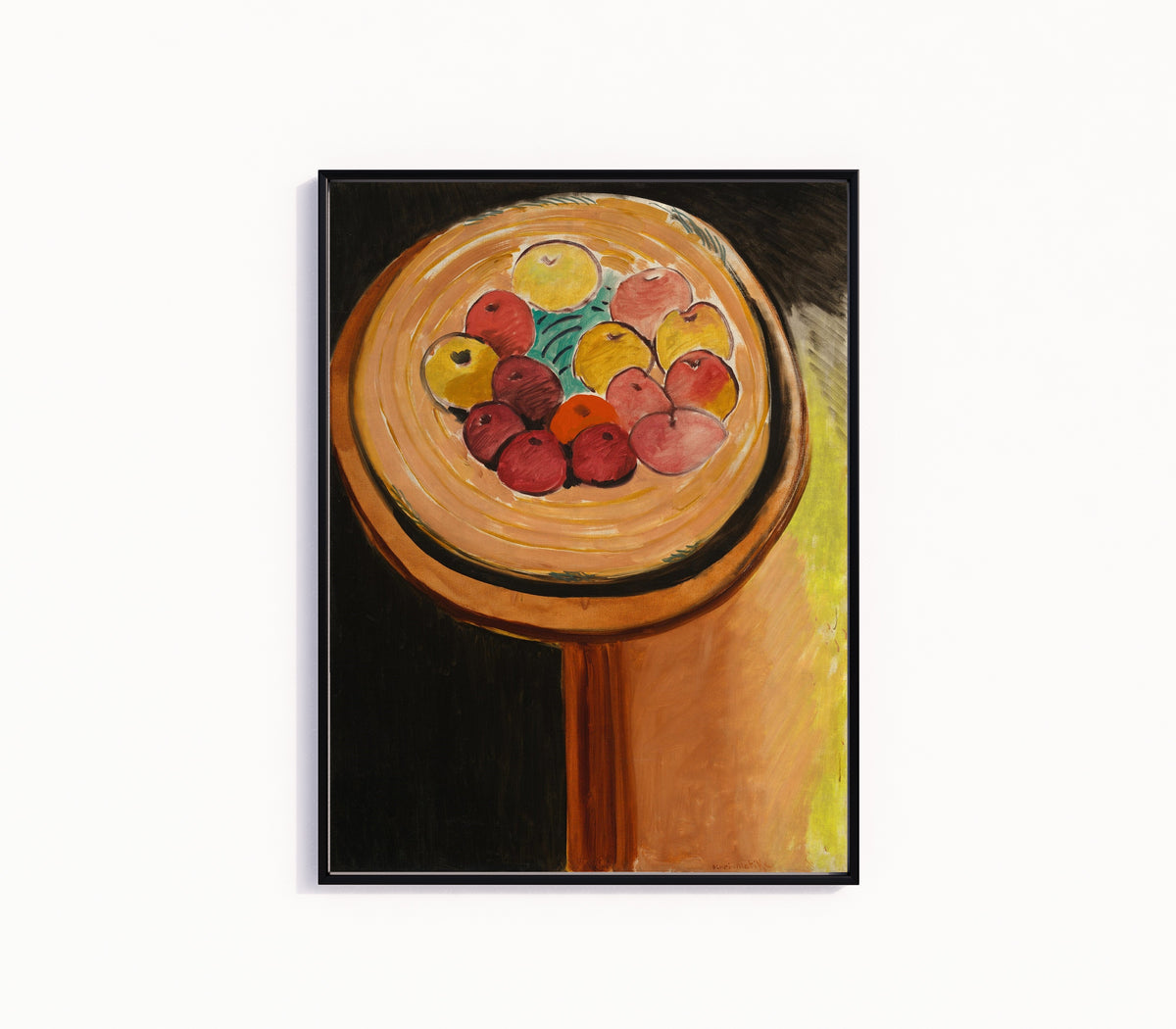 Framed art print of Apples by Henri Matisse, in a slim black frame on a plain white wall