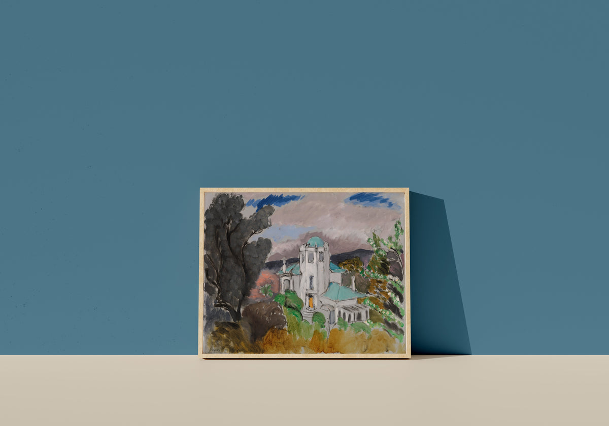 Framed art print of Blue Villa by Henri Matisse, in a light wood frame leaning on a blue wall