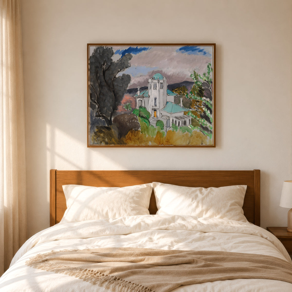 Framed art print of Blue Villa by Henri Matisse, in a slim wood frame above a bed in a sunlit bedroom
