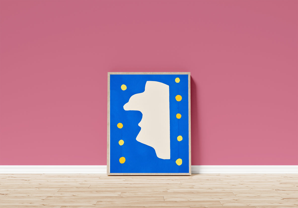 Framed art print of Monsieur Loyal by Henri Matisse, in a light wood frame leaning on a pink wall above a wooden floor