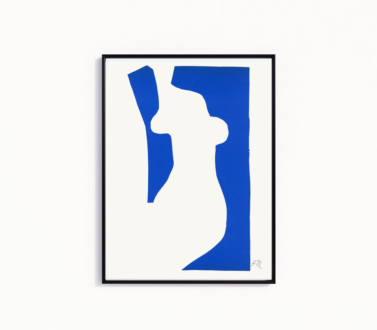 Framed art print of Venus by Henri Matisse, in a slim black frame on a plain white wall
