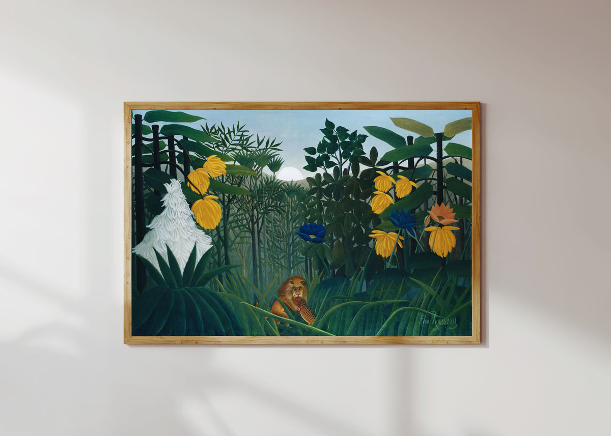 Framed art print of The Repast of the Lion by Henri Rousseau, in a light wood frame on a sunlit white wall