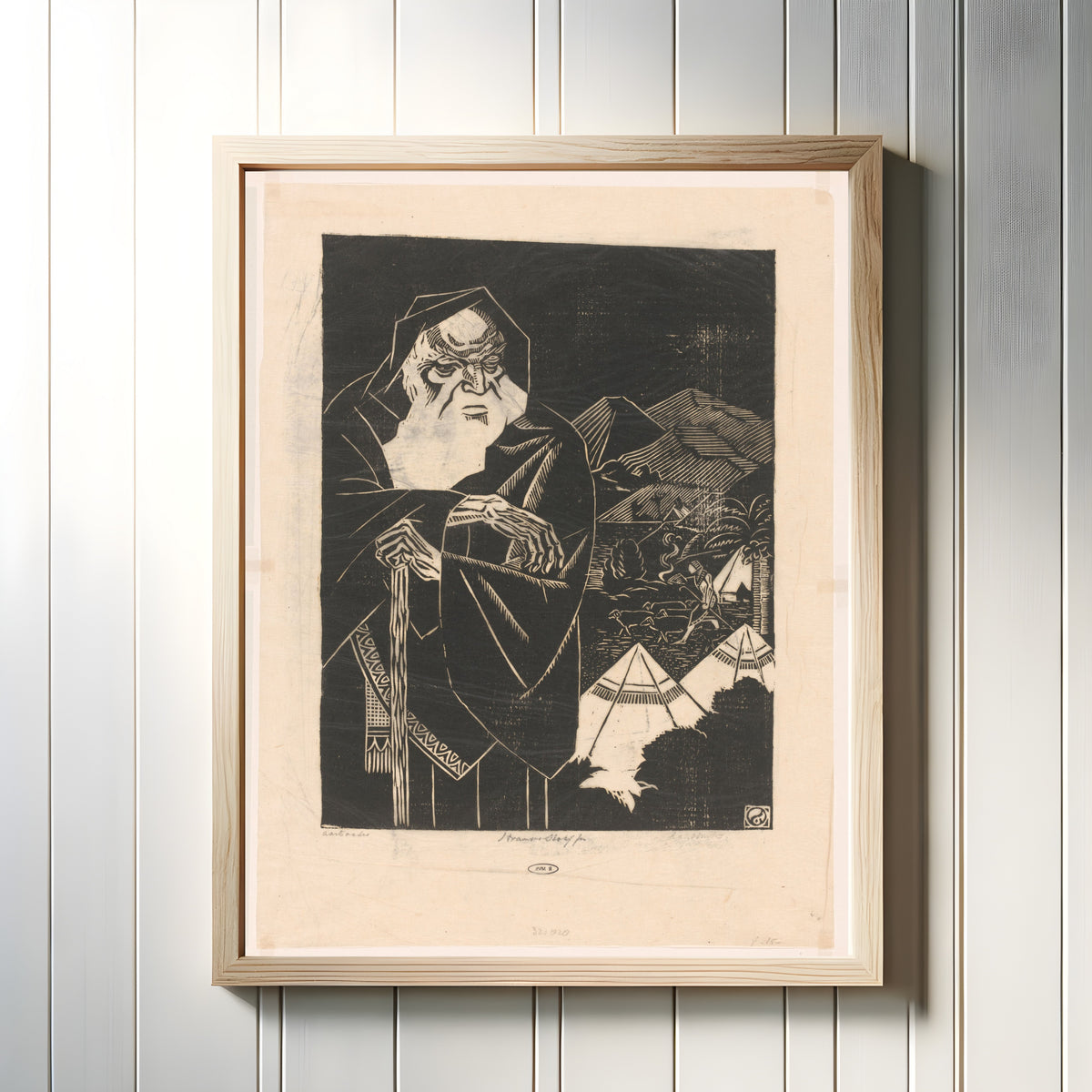 Framed art print of Aartsvader [Patriarch] by Henri van der Stok, in a light wood frame on a white panelled wall