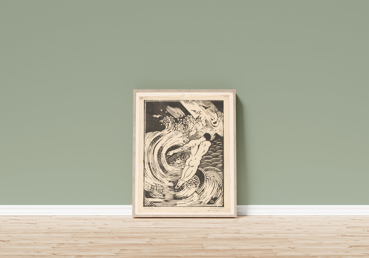 Framed art print of De visscher [The fisherman] by Henri van der Stok, in a light wood frame leaning on a sage green wall above a wooden floor