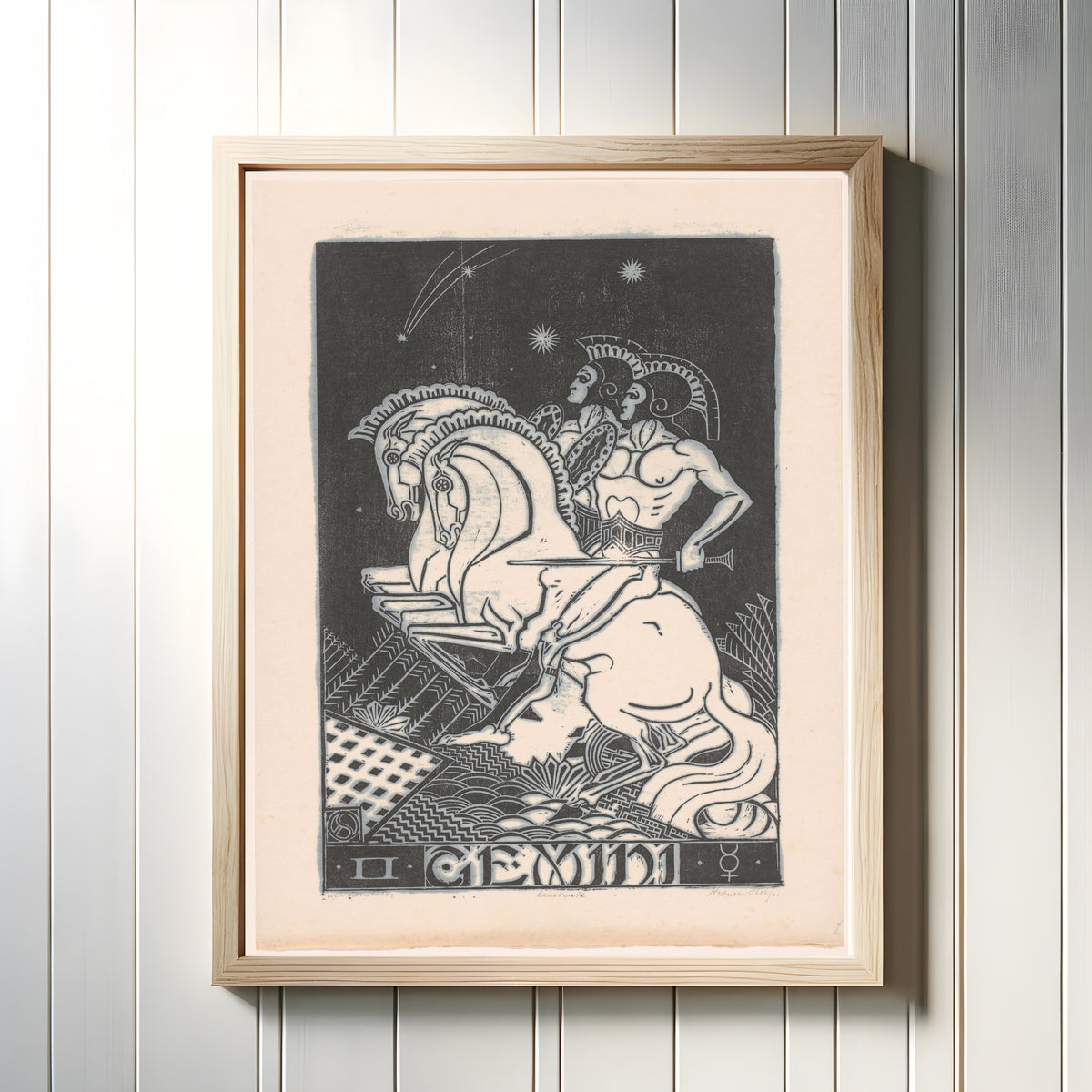 Framed art print of Sterrenbeeld tweelingen [Zodiac sign Gemini] by Henri van der Stok, in a light wood frame on a white panelled wall