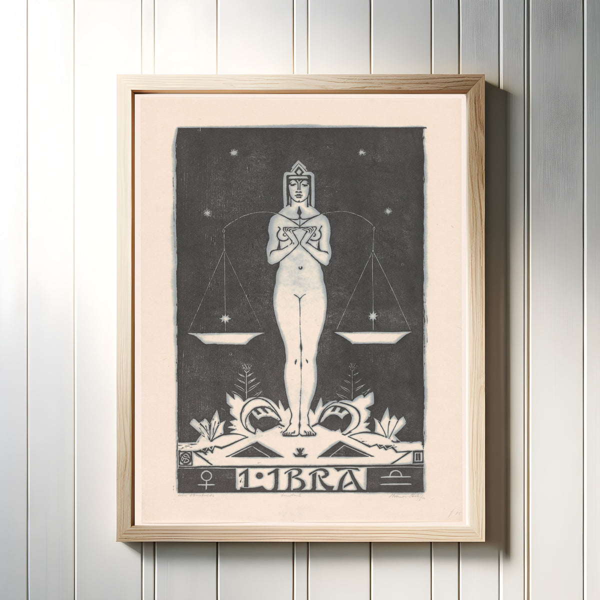 Framed art print of Sterrenbeeld weegschaal [Zodiac sign Libra] by Henri van der Stok, in a light wood frame on a white panelled wall