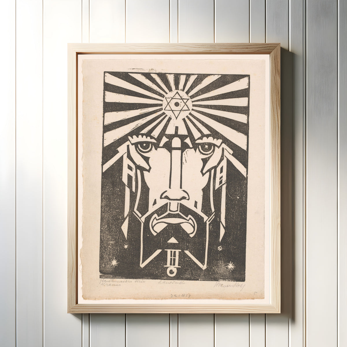 Framed art print of Uranus by Henri van der Stok, in a light wood frame on a white panelled wall