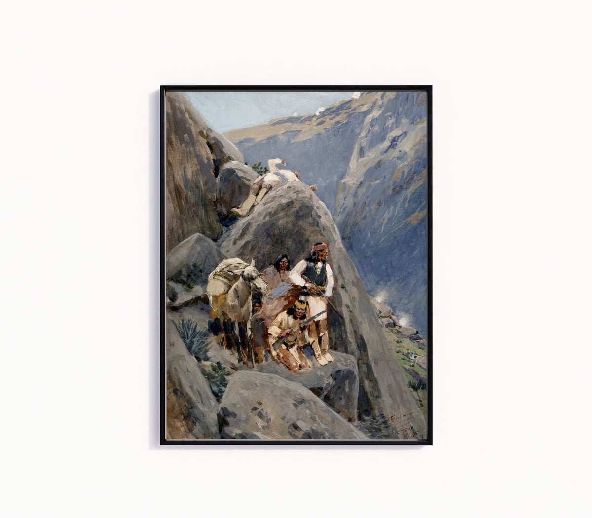 Framed art print of Apache Indians in the Mountains by Henry Farny, in a slim black frame on a plain white wall