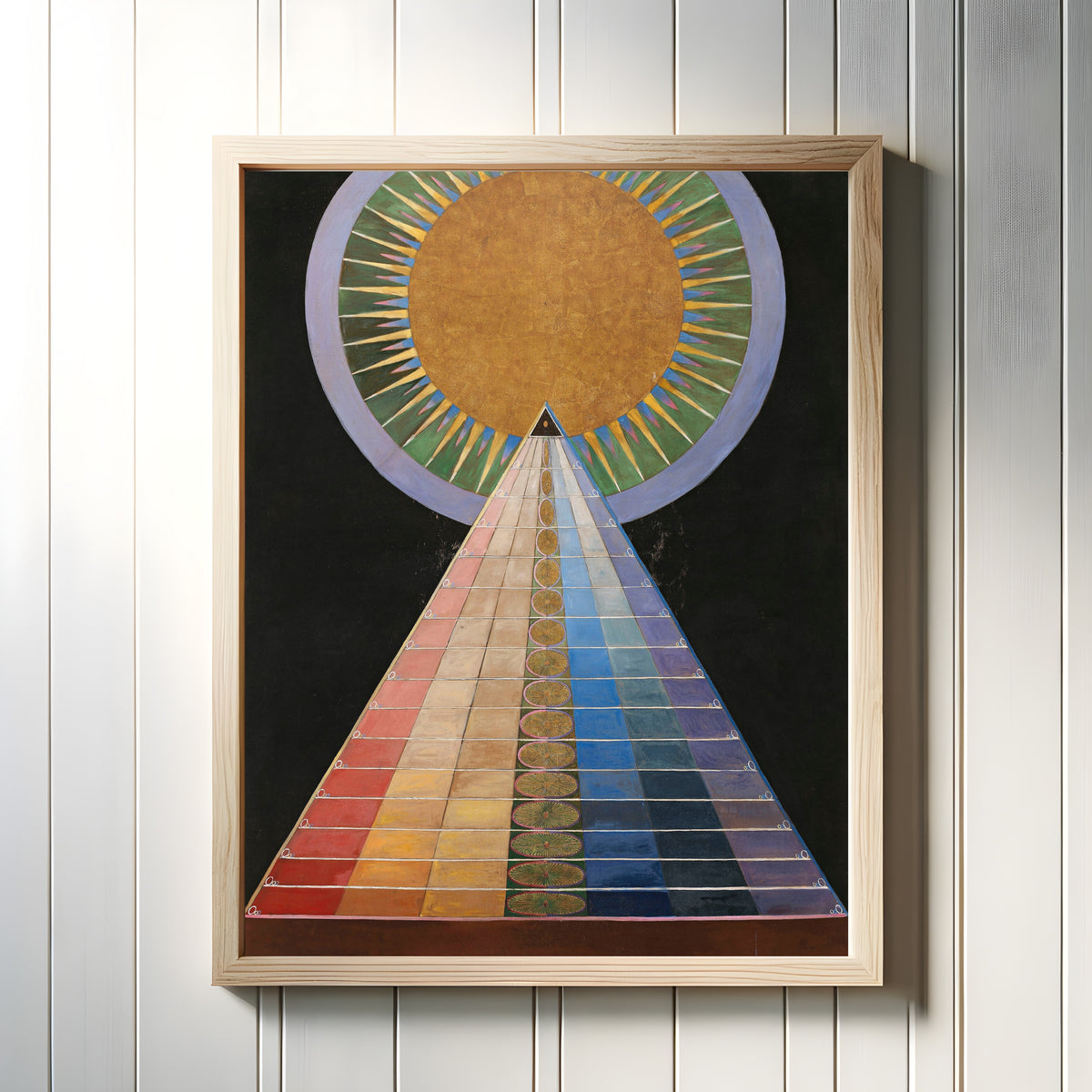 Framed art print of Altarpiece No. 1, Group X by Hilma af Klint, in a light wood frame on a white panelled wall