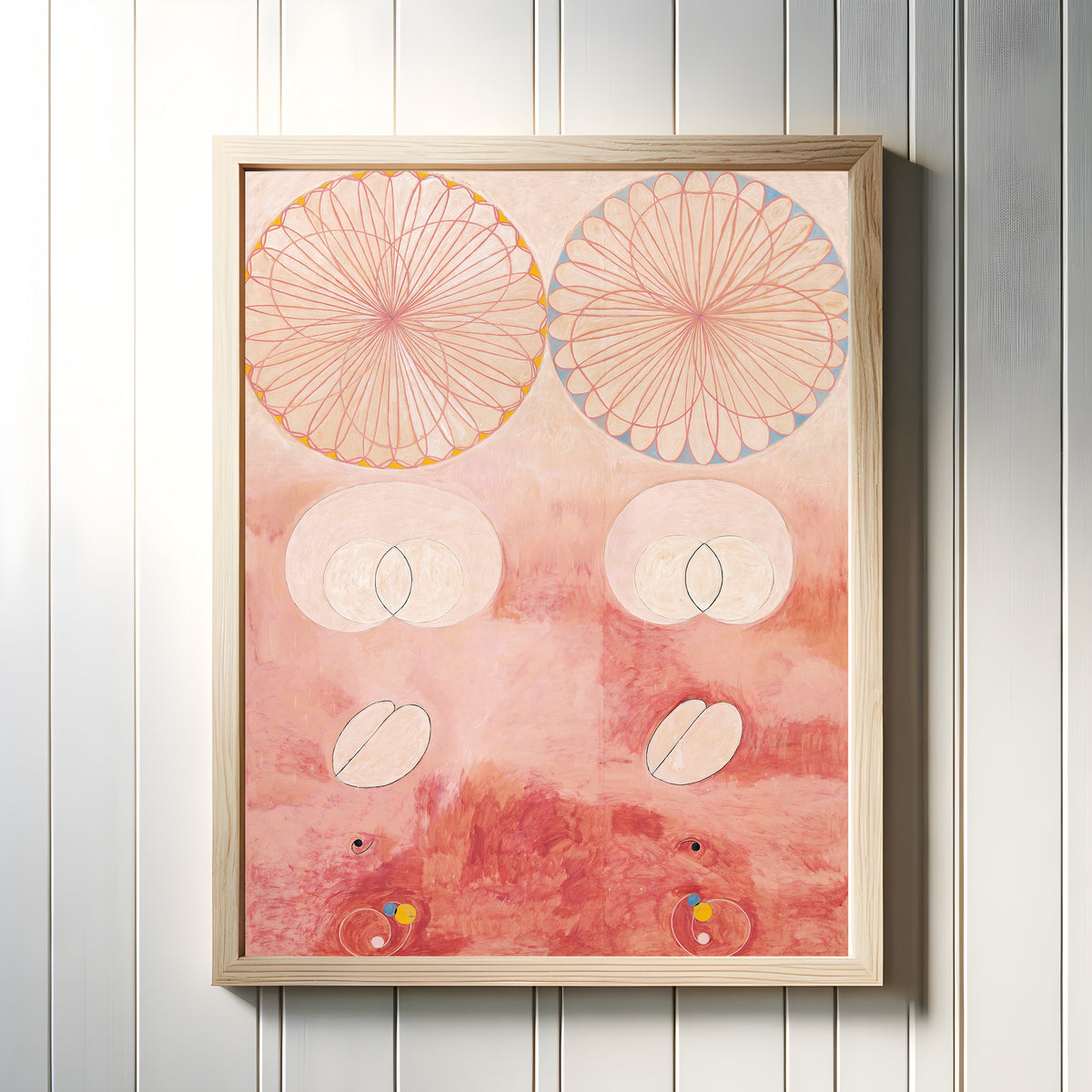 Framed art print of The Ten Largest, No. 9, Old Age by Hilma af Klint, in a light wood frame on a white panelled wall