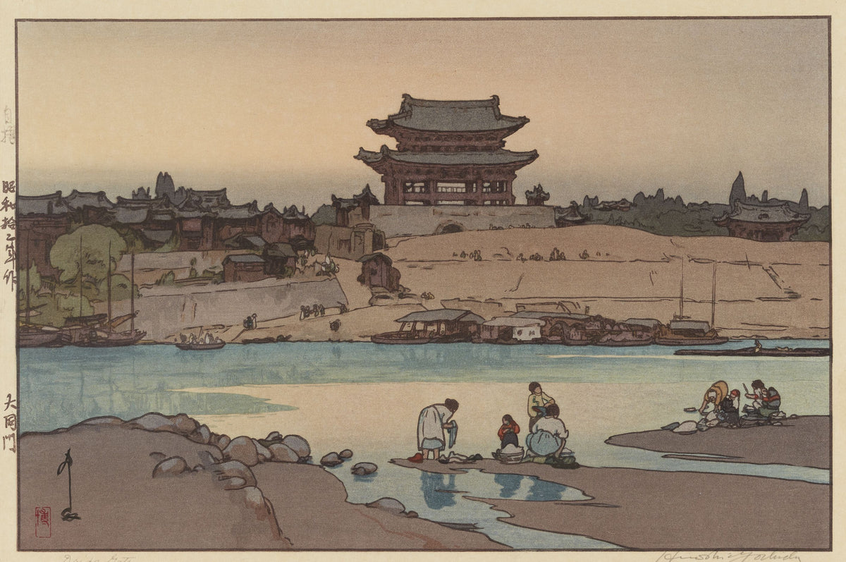 Daidomon (Taedong Gate), Pyongyang by Hiroshi Yoshida — A tiled gate tower above a river where figures wash cloth at the shore