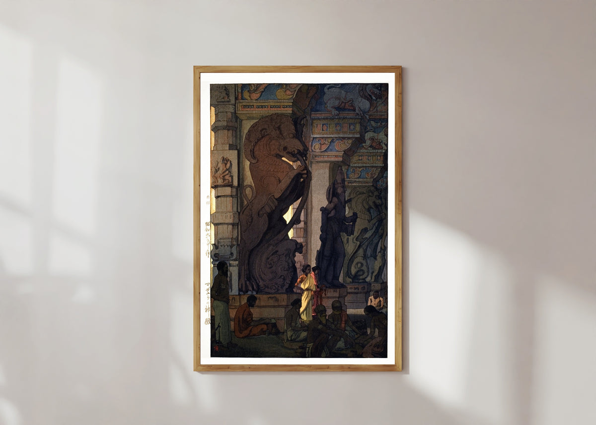 Framed art print of Great Temple at Madurai, Tamil Nadu, India by Hiroshi Yoshida, in a light wood frame on a sunlit white wall