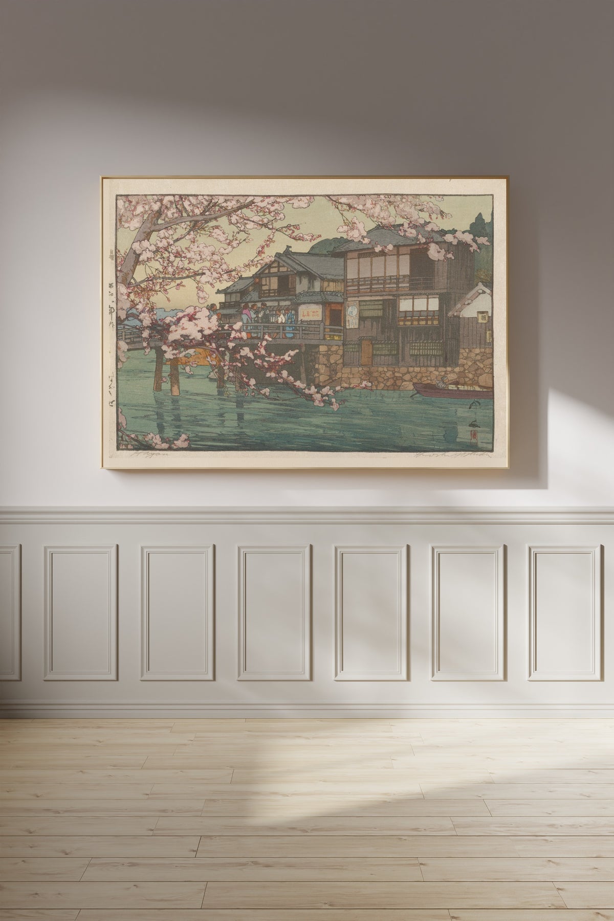 Framed art print of Hayase by Hiroshi Yoshida, on a panelled wall in afternoon light