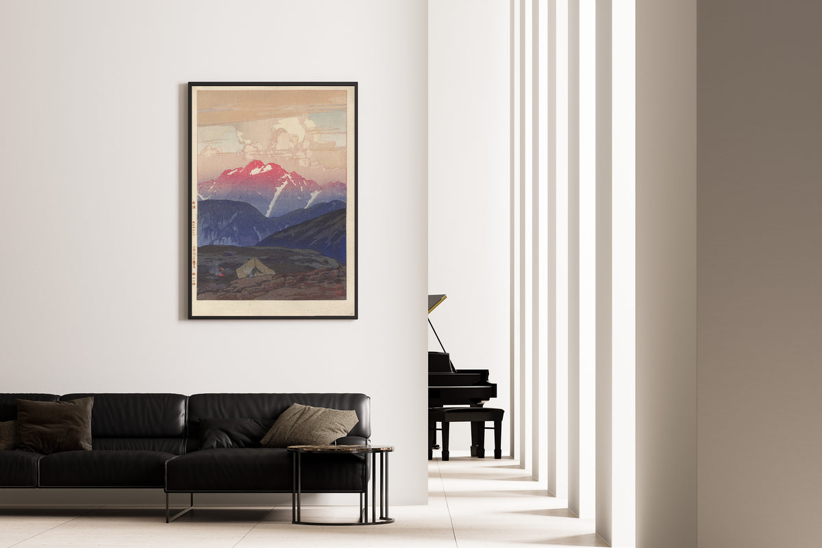 Framed art print of Morning at Mount Tsurugi by Hiroshi Yoshida, on the wall of a minimal living room