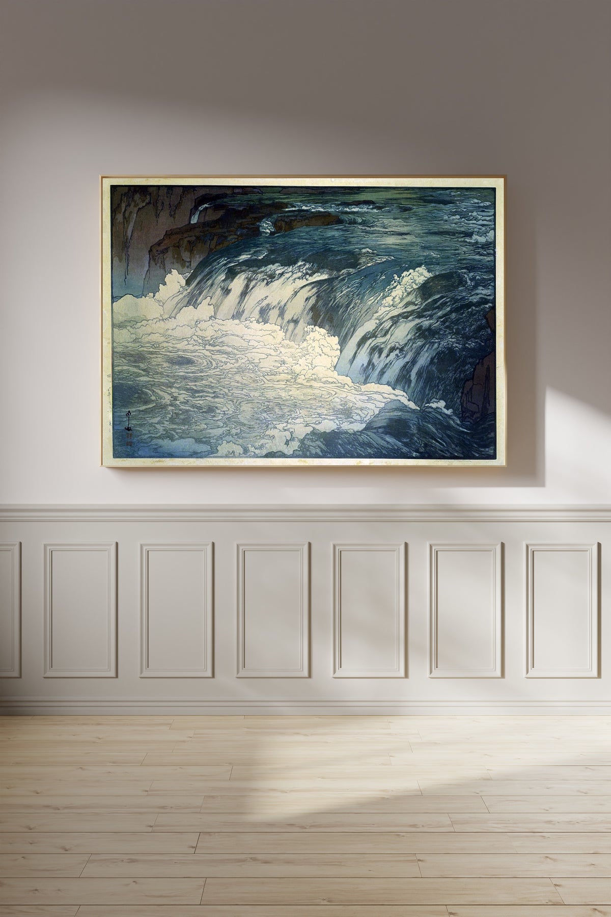 Framed art print of Rapids by Hiroshi Yoshida, on a panelled wall in afternoon light