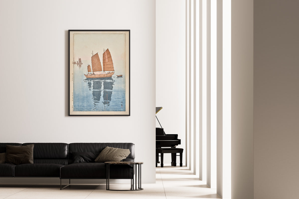Framed art print of Sailing Boats, Forenoon by Hiroshi Yoshida, on the wall of a minimal living room