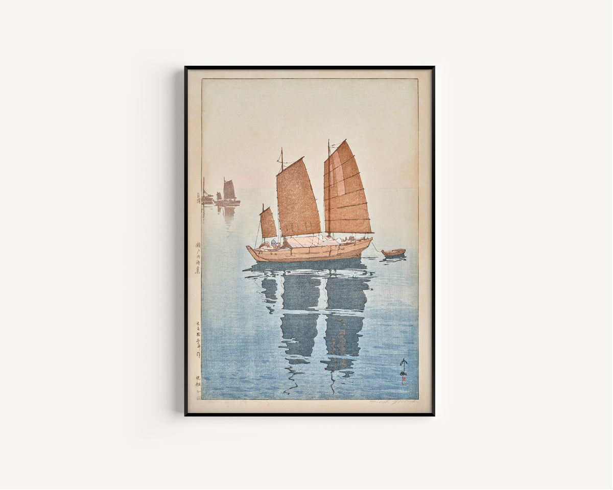 Framed art print of Sailing Boats, Forenoon by Hiroshi Yoshida, in a slim black frame on a plain white wall