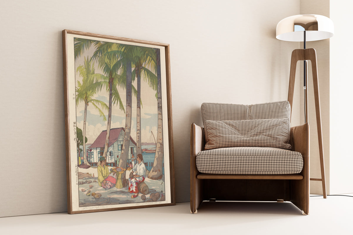 Framed art print of Singapore by Hiroshi Yoshida, leaning against a wall beside an armchair and a floor lamp
