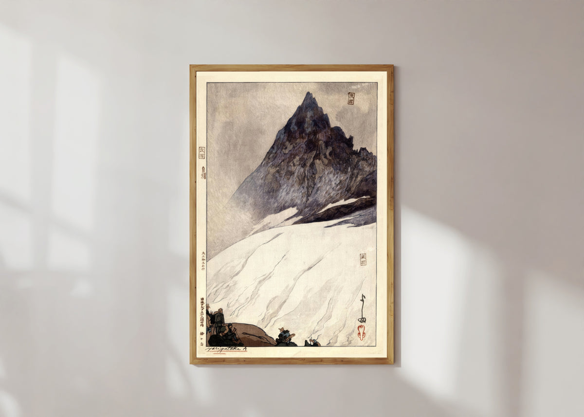 Framed art print of Yarigadake by Hiroshi Yoshida, in a light wood frame on a sunlit white wall