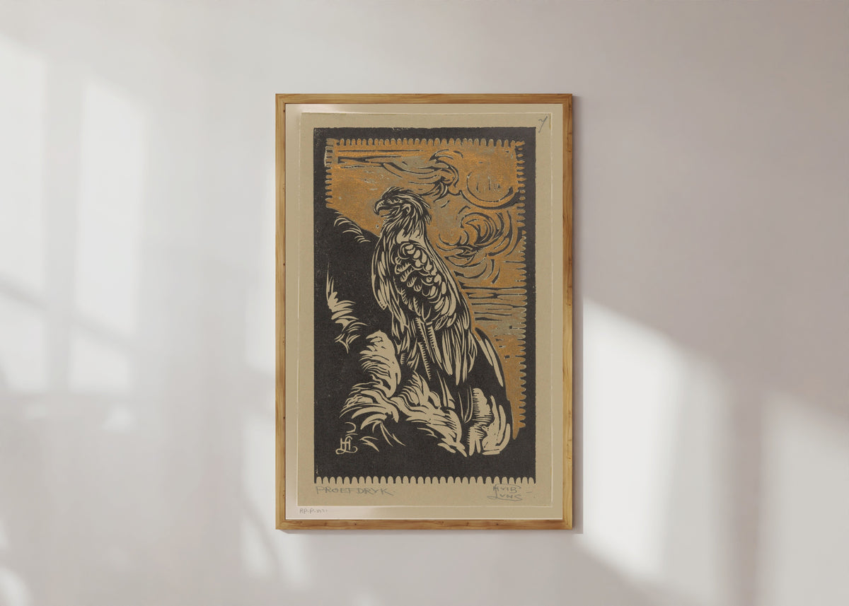 Framed art print of Arend [Eagle] by Huib Luns, in a light wood frame on a sunlit white wall