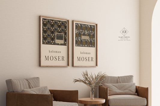 Kolomon Moser set of 2 framed iconic art prints on beige wall above armchairs, elevating living room decor.