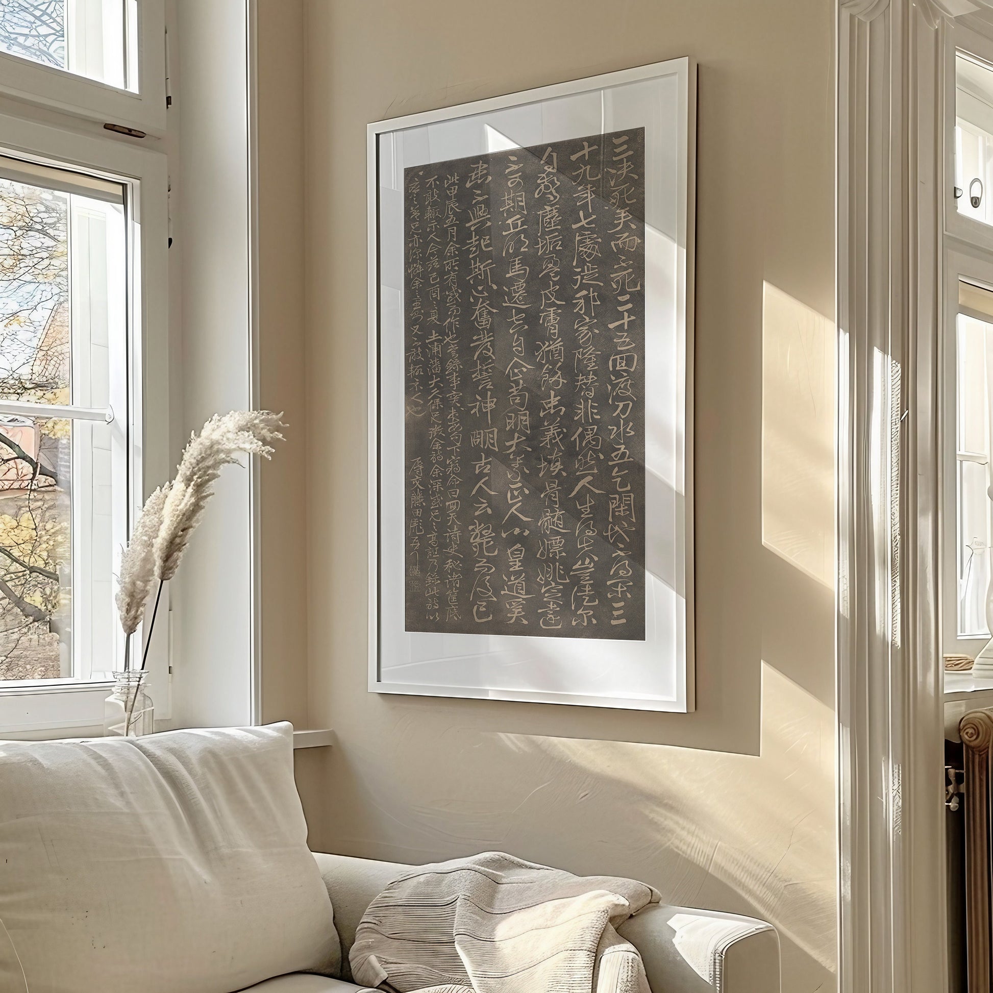 Vintage Asian calligraphy art in a modern living room, Fujita Toko's "Poem" framed on wall, natural light streaming through windows.